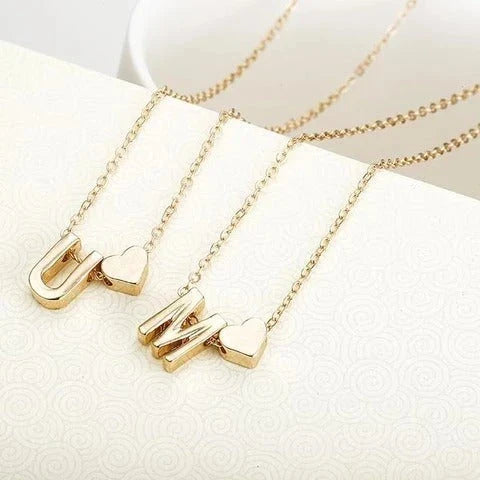 Heart-shaped letter pendant necklace with clavicle chain in various metallic colors