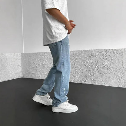 Men's blue straight-leg denim trousers with mid-waist design and zipper fly closure