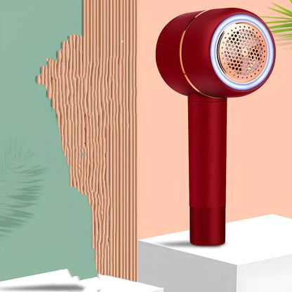 White rechargeable lint remover with detachable head and USB charging cable