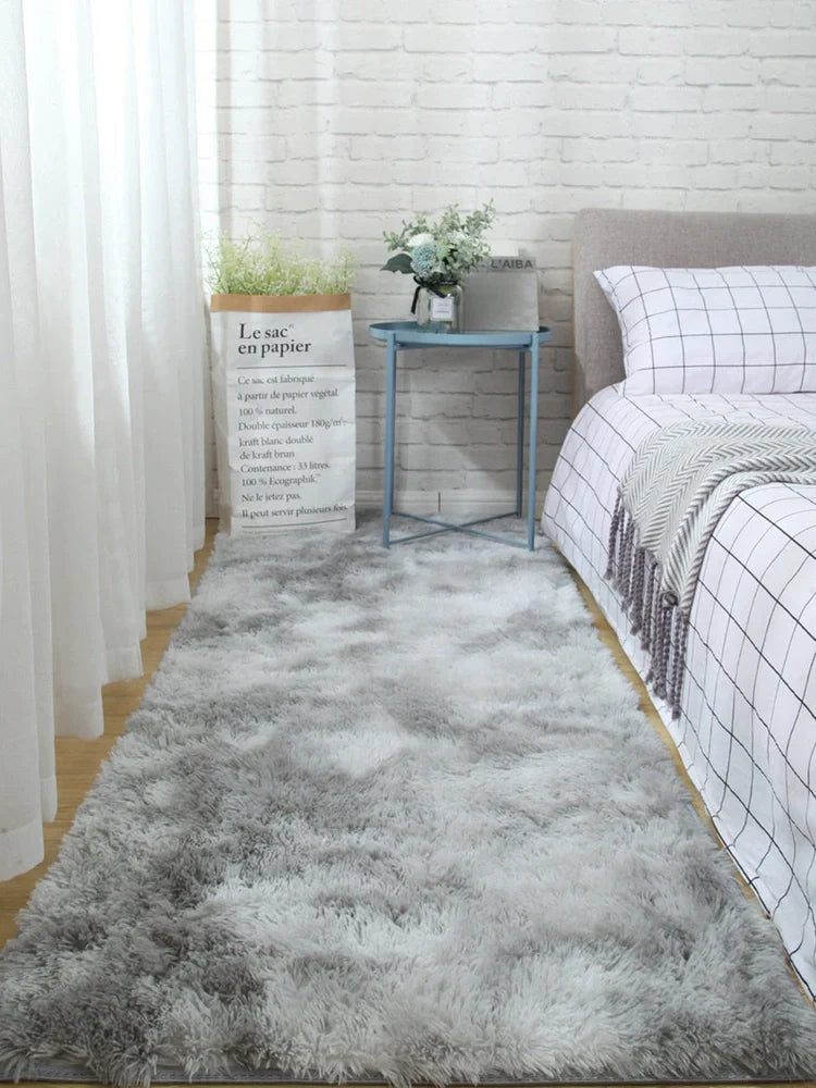 Tie-dyed variegated silk wool carpet floor mat showing organic colour patterns with polyester fibre suede backing