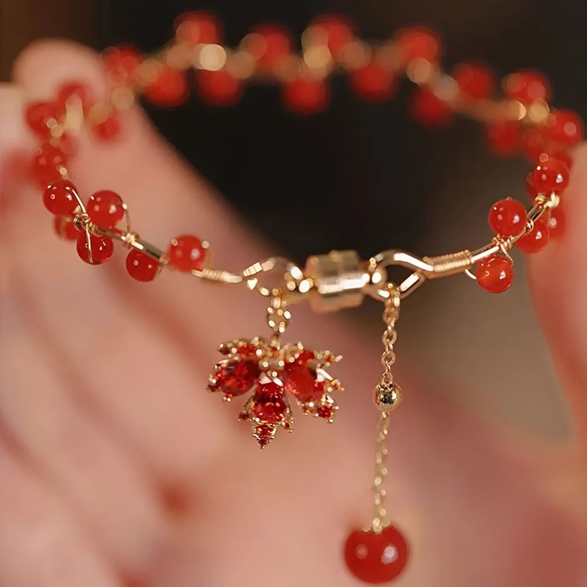 Red ginkgo leaf charm on an alloy magnetic bracelet with a natural Chinese style.