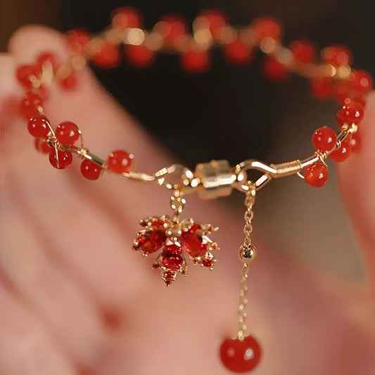 Red ginkgo leaf charm on an alloy magnetic bracelet with a natural Chinese style.