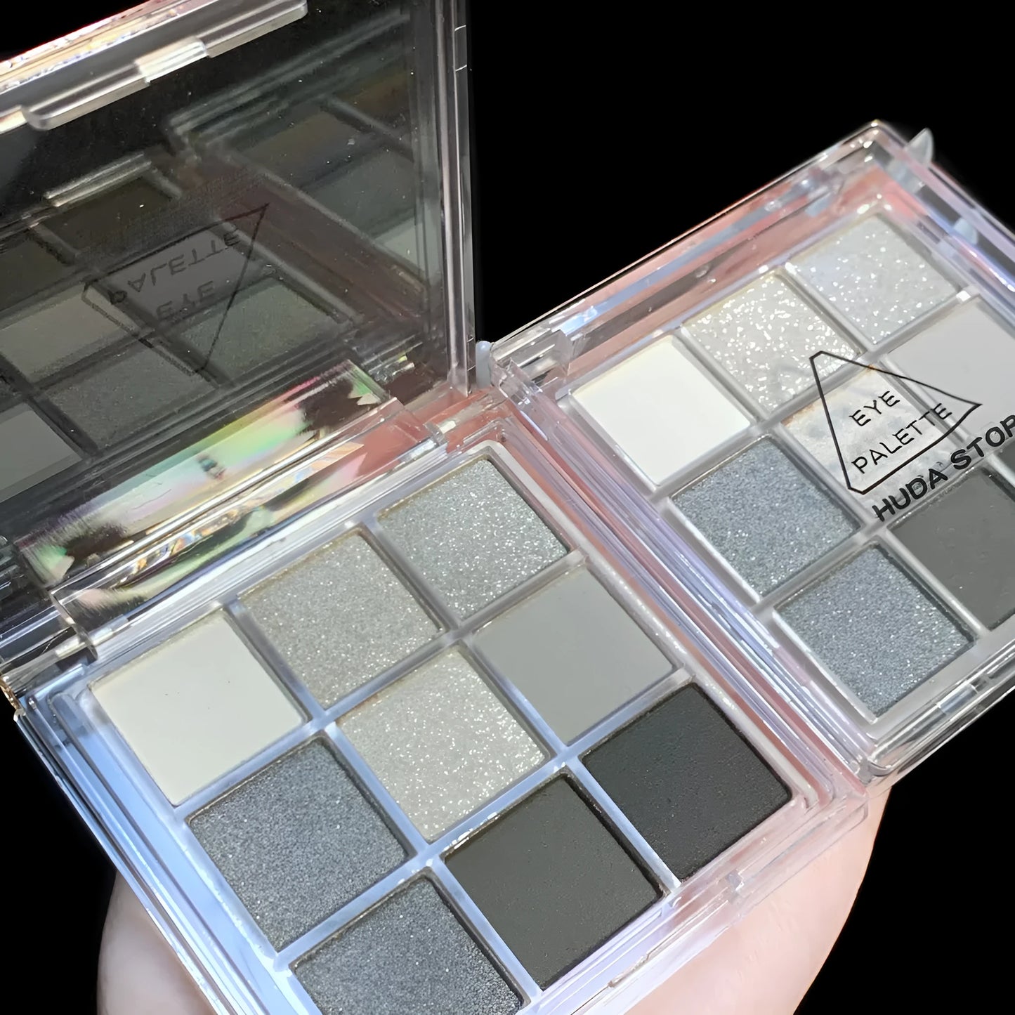 CZ0069 nine-colour smokey eyeshadow palette showing white, silver, black, and iron grey shades.