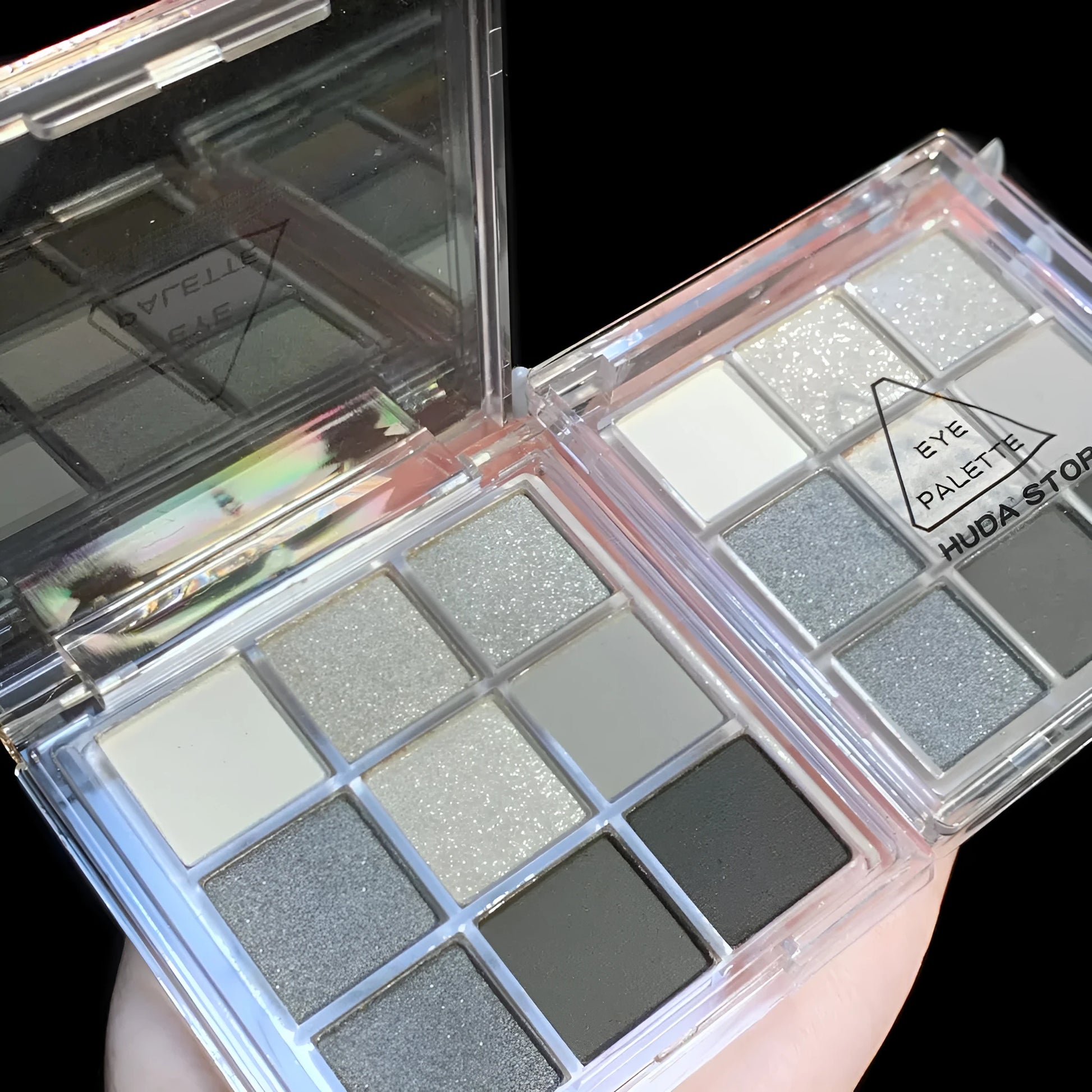 CZ0069 nine-colour smokey eyeshadow palette showing white, silver, black, and iron grey shades.