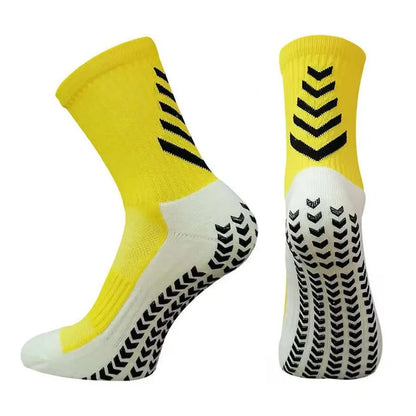 Men's mid-calf athletic socks with non-slip silicone grips in Arrow Black colour with geometric pattern design