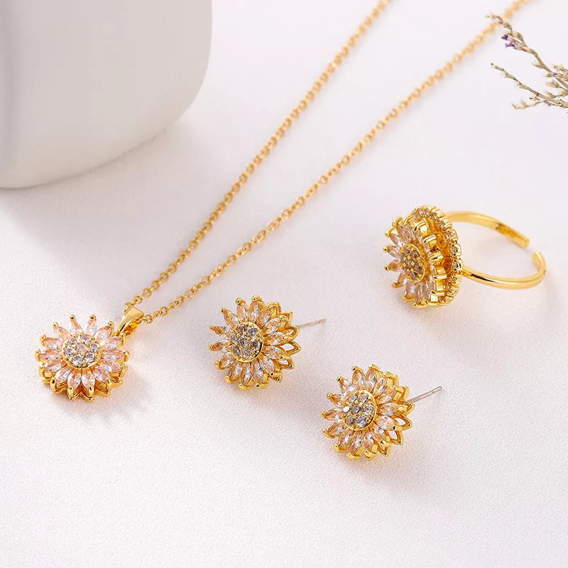 Sunflower stainless steel jewelry set with zircon accents, including necklace, ring, and earrings