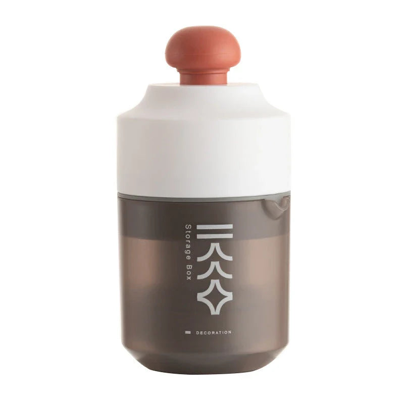 Premium manual citrus juicer in white, green, and pink colors, featuring a compact, portable design for effortless juice extraction