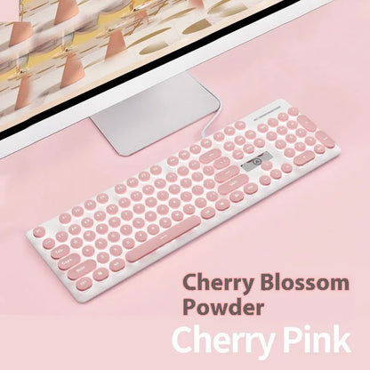 Punk mechanical feel keyboard with backlight in mint green, pink, or black blue light colours, measuring 44cm wide