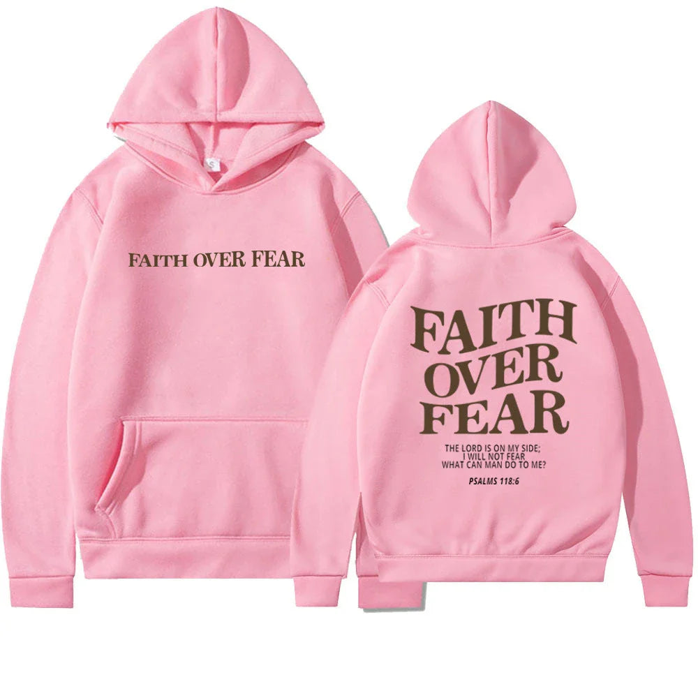 A stylish Christian hoodie with inspirational graphics and a message of faith over fear