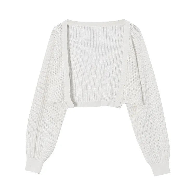 Long sleeve polyester blouse with lantern sleeves and hollow detail in apricot colour.