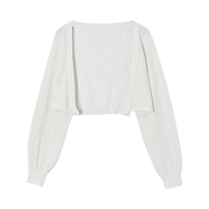 Long sleeve polyester blouse with lantern sleeves and hollow detail in apricot colour.