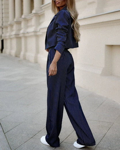 Stylish striped suit set with cropped top and straight-leg pants in a variety of classic colors