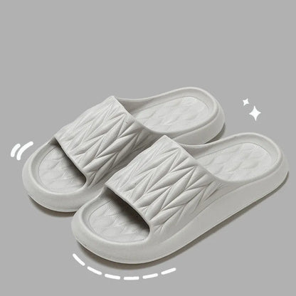 Leaf texture pattern EVA slippers in various colours showing non-slip sole design