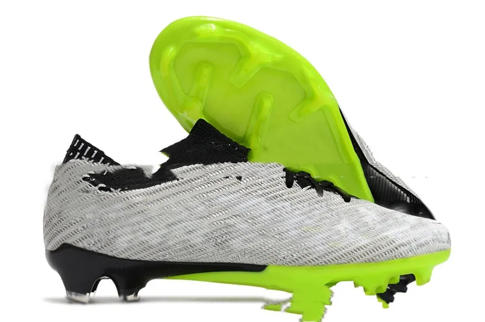 Men's knitted football shoes with air cushion and FG rubber studs on natural grass
