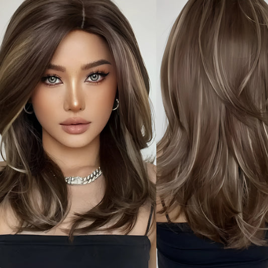 Mid-length curly synthetic wig with long bangs in a platinum gradient colour, shown on a wig stand.