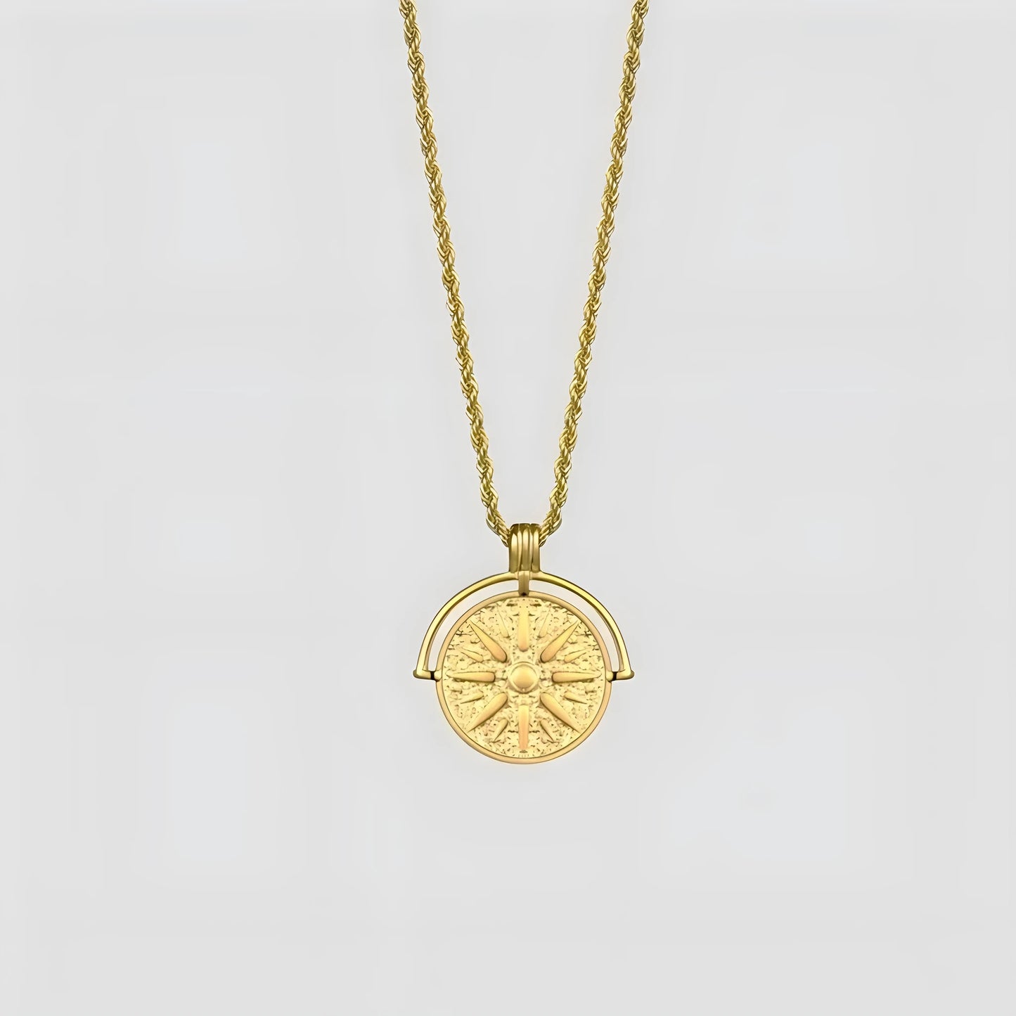 Circular stainless steel pendant necklace with sunflower embossing and star designs on adjustable hemp flower chain