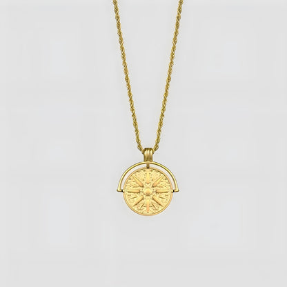 Circular stainless steel pendant necklace with sunflower embossing and star designs on adjustable hemp flower chain