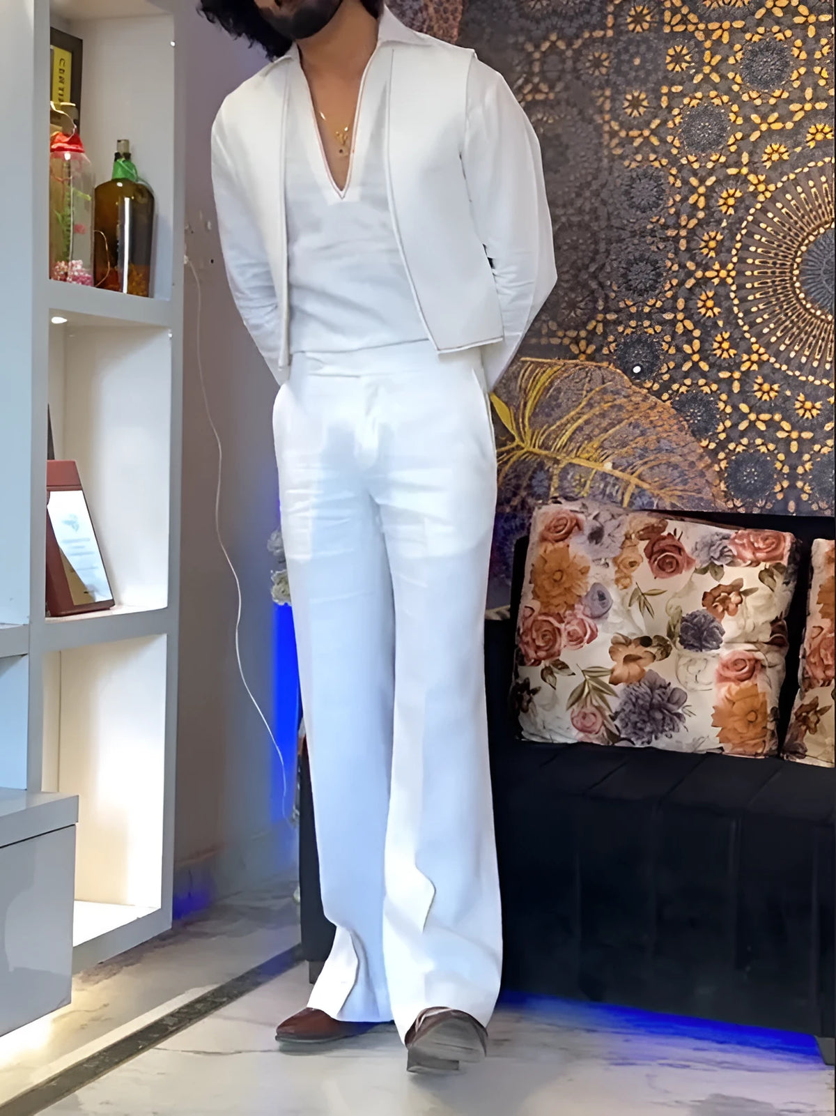 White three-piece polyester outfit showing V-neck shirt, sleeveless vest, and full-length trousers