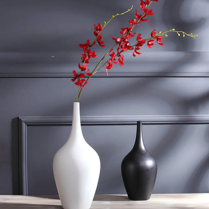 White ceramic tall vase with matte finish measuring 160mm height for flower arrangements