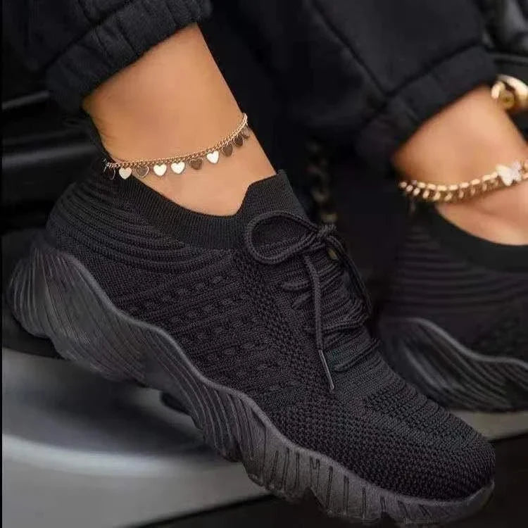Stylish knit sneakers in various colors for active women, featuring a lightweight, breathable, and comfortable design.