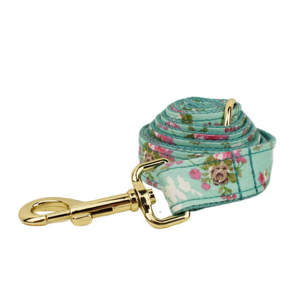 Fabric dog collar and leash set with detachable rose bow in green background