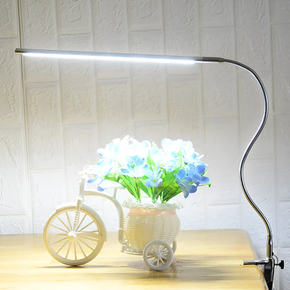 Silver aluminium alloy LED nail lighting table lamp with long arm and clip mounting for beauty workstations