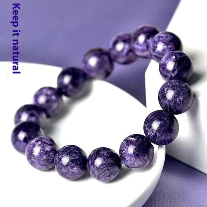 Natural transparent charoite crystal bracelet with platinum setting, available in 6mm, 8mm, 10mm, and 12mm bead sizes