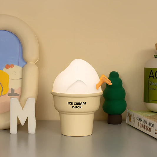 Abstract duck night lamp with ice cream colours measuring 103mm tall with USB charging port