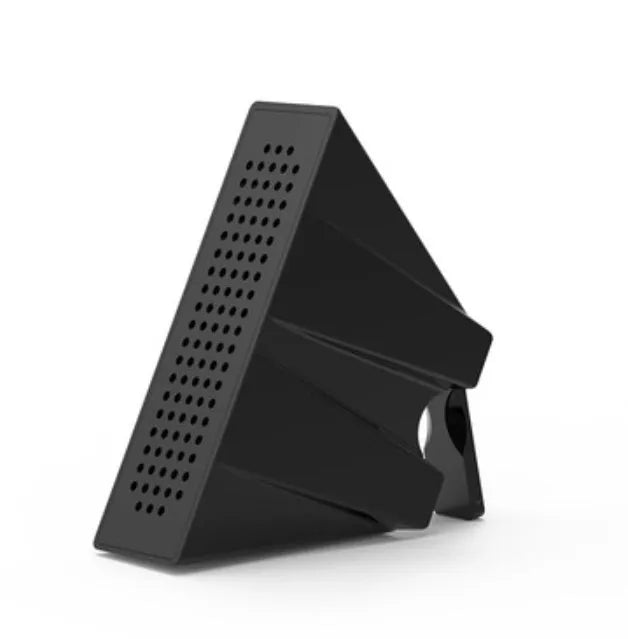 Portable black ABS plastic phone amplifier bracket holding a smartphone on a desk.