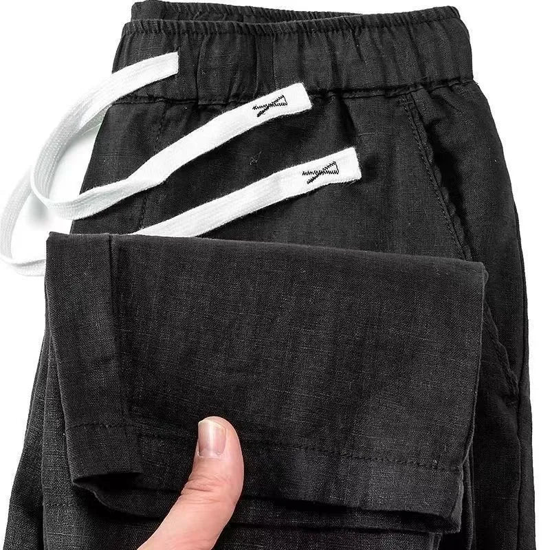 Pure linen Chinese style elastic waist trousers in straight leg cut with drawstring closure