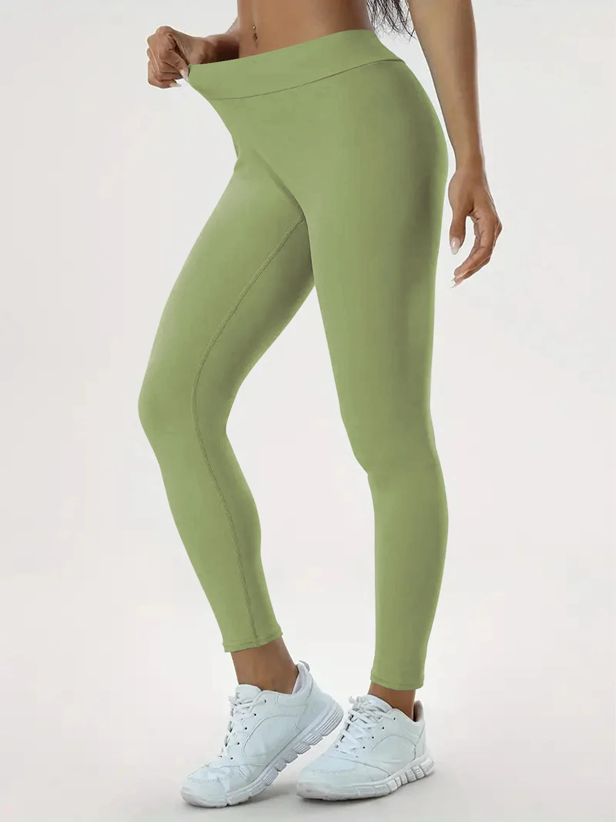 Slimming high-waist yoga pants with hidden tummy control, available in various colors and sizes