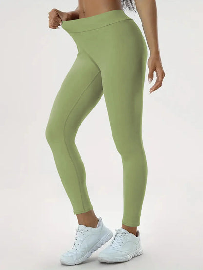 Slimming high-waist yoga pants with hidden tummy control, available in various colors and sizes