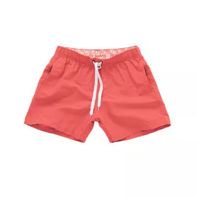 Men's summer surf shorts in various colors, made from 100% polyester for quick drying and durability