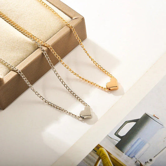 Elegant clavicle necklace with a double-sided love pendant, made of high-quality alloy for a timeless, fashion-forward look.