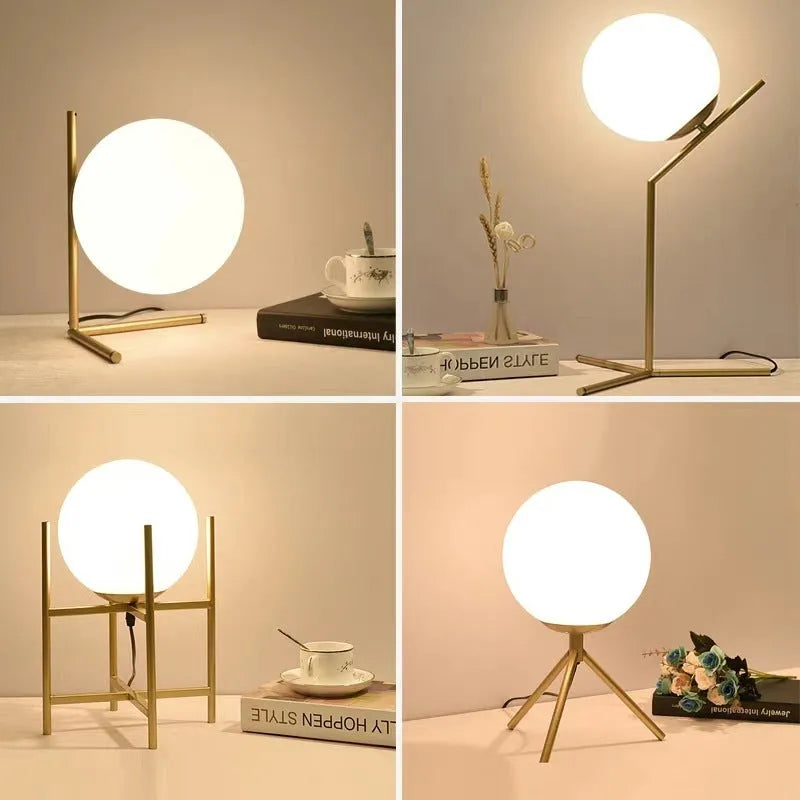 Creative glass table lamp with LED light in one of three available sizes for a living room or study
