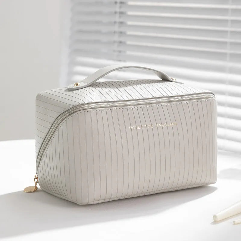 Vertical pattern pillow makeup bag with cubic 22.5x12.5x12.5cm dimensions in beige, black, brown, grey or pink
