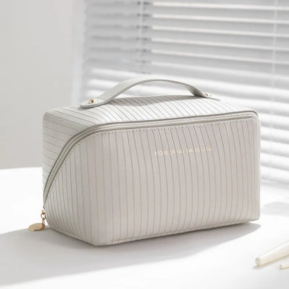 Vertical pattern pillow makeup bag with cubic 22.5x12.5x12.5cm dimensions in beige, black, brown, grey or pink