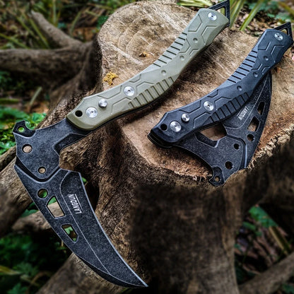 Folding outdoor axe with tool steel blade in army green, showing 35cm extended and 26cm folded positions with nylon sheath