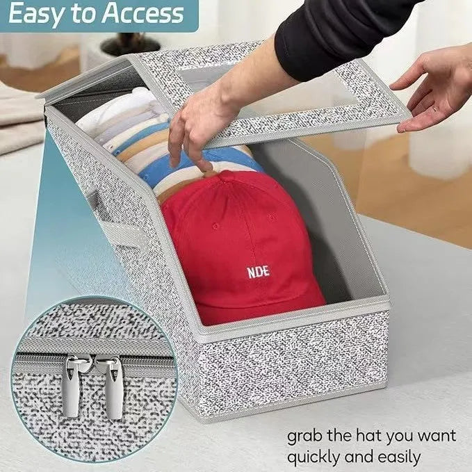 Grey foldable woven fabric storage box with dimensions 42cm by 22cm by 17cm for organising caps and sundries.