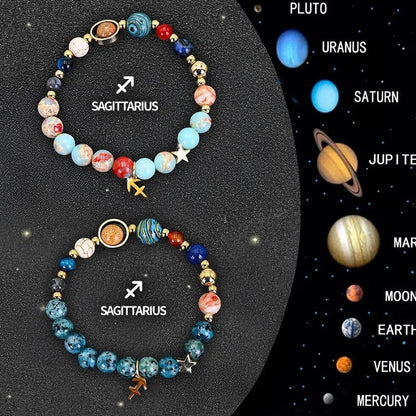 Set of two natural stone beaded bracelets showing zodiac sign designs on an elastic cord.