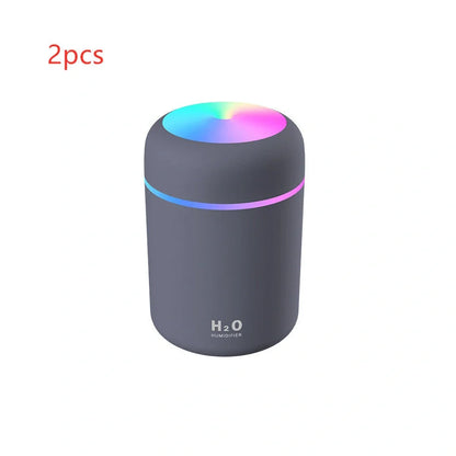 Compact USB car humidifier with colourful LED light and 300ml water tank for vehicle use