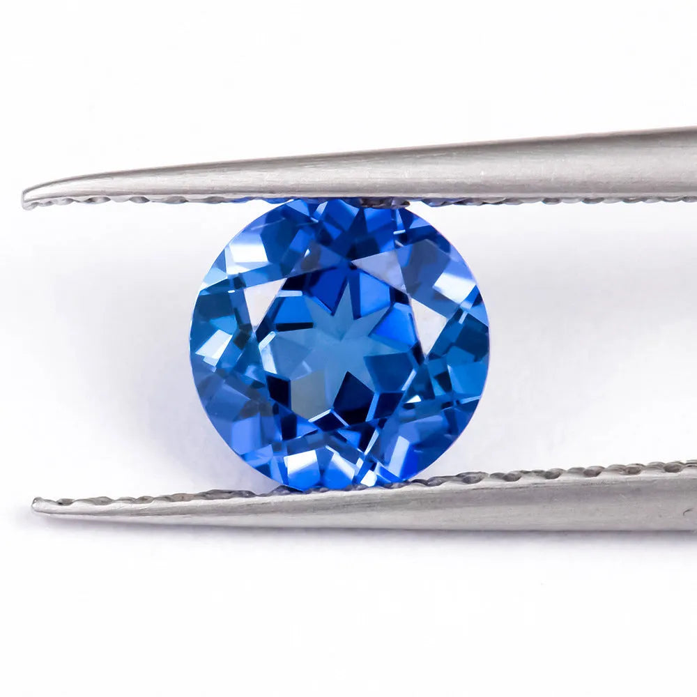 Royal blue love shaped tiara cultivate gemstone in heart and round cuts for jewellery making.