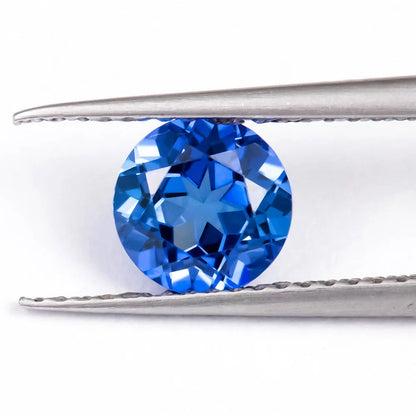 Royal blue love shaped tiara cultivate gemstone in heart and round cuts for jewellery making.