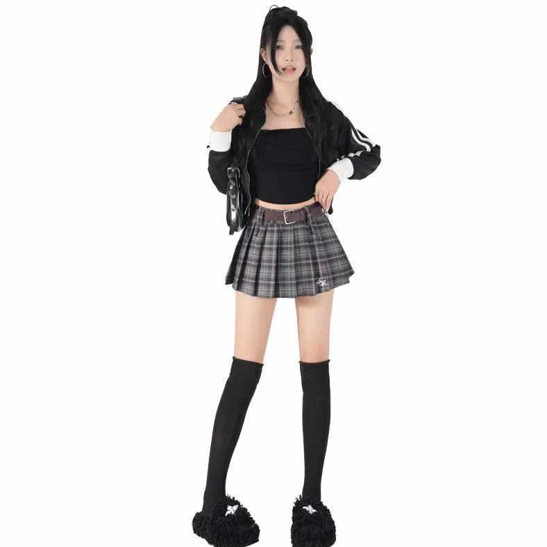 High-waisted cotton A-line skirt with pleated design in black plaid pattern, showing spandex blend stretch and A-line silhouette