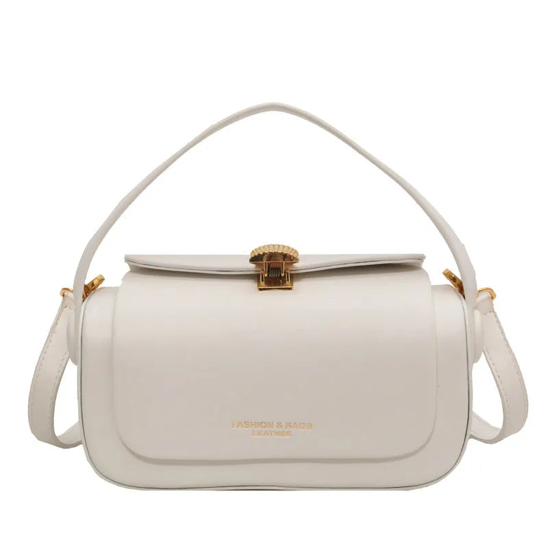 Women's personalised shoulder messenger bag in beige with lettering, showing adjustable strap and reinforced stitching details
