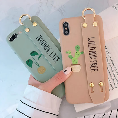 Green graffiti pattern wristband holder phone case for iPhone showing integrated wrist strap and back cover design