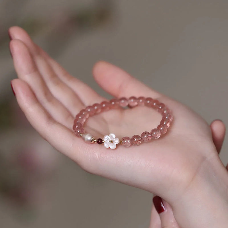 Strawberry Quartz Peach Blossom Bracelet for women made from crystal beads in a floral design for casual jewellery wear and fashion accessories as a gift item for female friends or partners.