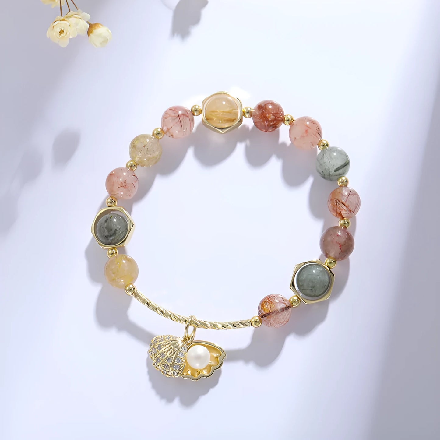 Women's cartoon style crystal bracelet with colourful hair crystal shell and red sealant flower shell designs