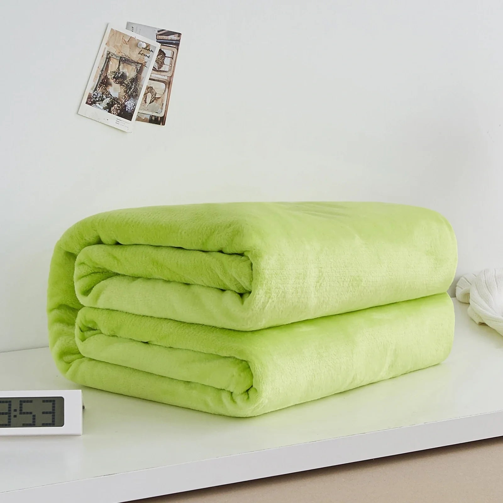 Coral fleece flannel blanket in beige showing textured surface and consistent edges