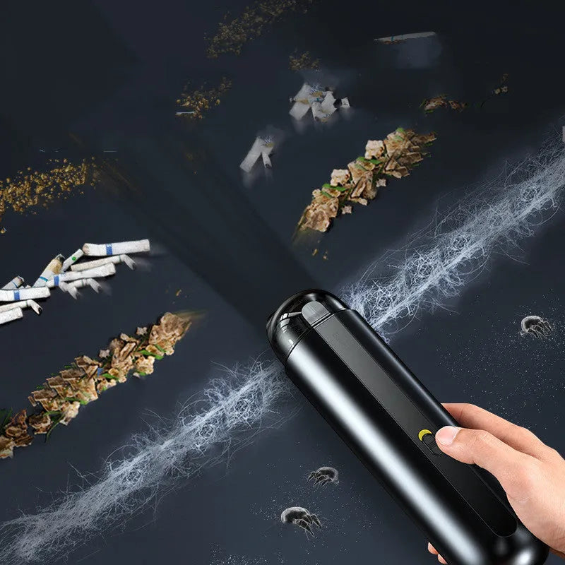 BASEUS handheld car vacuum cleaner in black with blowing hose attachment, showing compact size and dust bin
